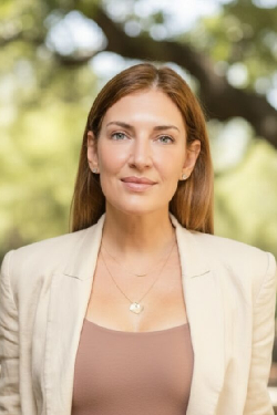 Portrait of woman outdoors in blazer